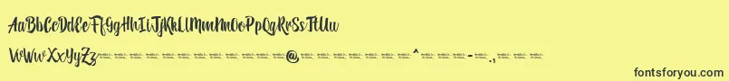 Reybro Font – Black Fonts on Yellow Background