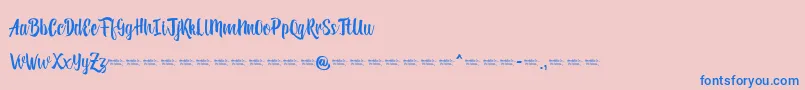 Reybro-Schriftart – Blaue Schriften auf rosa Hintergrund