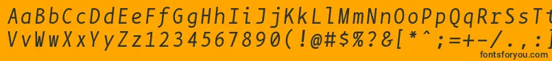 Czcionka BpmonoItalic – czarne czcionki na pomarańczowym tle