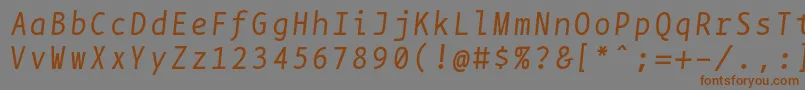 フォントBpmonoItalic – 茶色の文字が灰色の背景にあります。