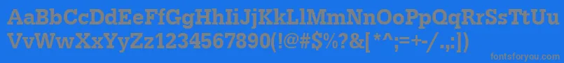 Urwegyptiennetmedextnar-Schriftart – Graue Schriften auf blauem Hintergrund