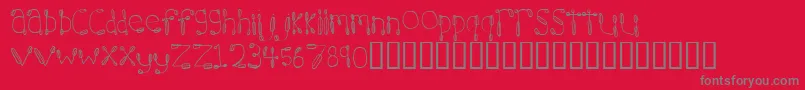 フォント7 Hours – 赤い背景に灰色の文字