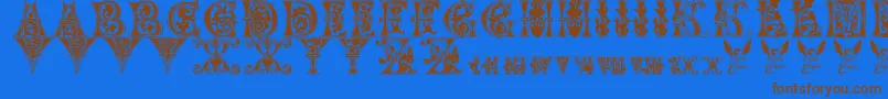 Więcej informacji o czcionce Floralmajuscules Czcionka Floralmajuscules – brązowe czcionki na niebieskim tle