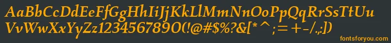 Шрифт KallosmditcTtMediumitalic – оранжевые шрифты на чёрном фоне