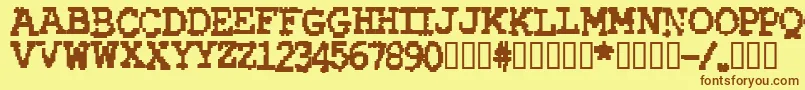 フォントRubberBiscuitBold – 茶色の文字が黄色の背景にあります。