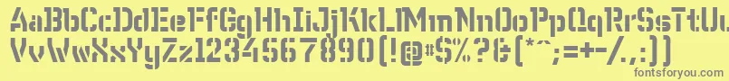WcWunderbachBtaDemibold-fontti – harmaat kirjasimet keltaisella taustalla