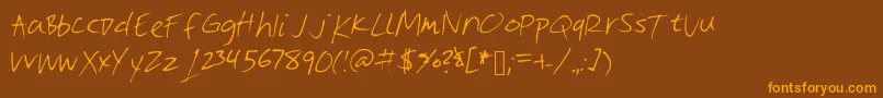 Vite Font – Orange Fonts on Brown Background
