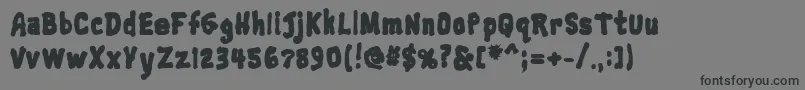 Trainwreckblack-Schriftart – Schwarze Schriften auf grauem Hintergrund