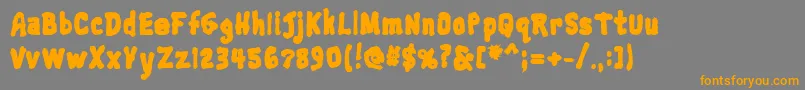 Trainwreckblack Font – Orange Fonts on Gray Background