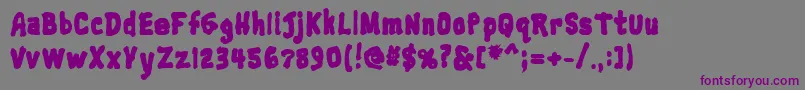Trainwreckblack-Schriftart – Violette Schriften auf grauem Hintergrund