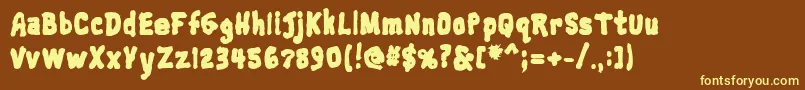 Trainwreckblack Font – Yellow Fonts on Brown Background