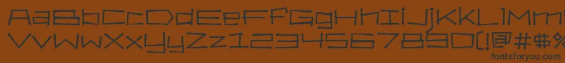 Bahamaslim Font – Black Fonts on Brown Background