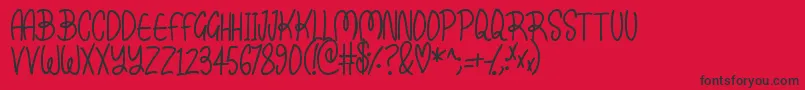 Kissy Font – Black Fonts on Red Background