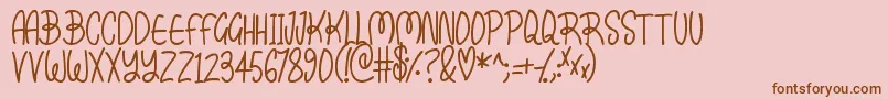 Kissy-Schriftart – Braune Schriften auf rosa Hintergrund