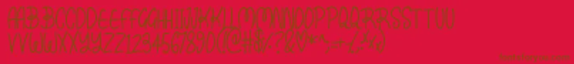 Kissy Font – Brown Fonts on Red Background