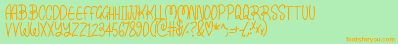 Kissy Font – Orange Fonts on Green Background
