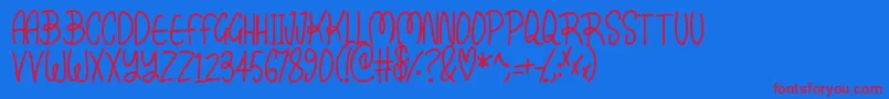 Kissy-Schriftart – Rote Schriften auf blauem Hintergrund