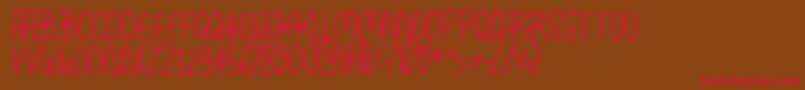 Kissy Font – Red Fonts on Brown Background