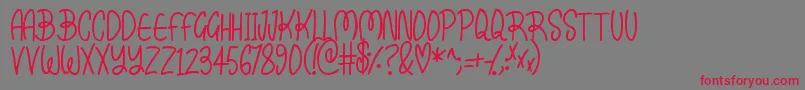 Kissy-Schriftart – Rote Schriften auf grauem Hintergrund