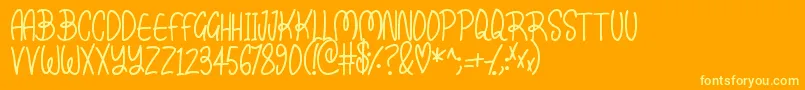 Kissy Font – Yellow Fonts on Orange Background