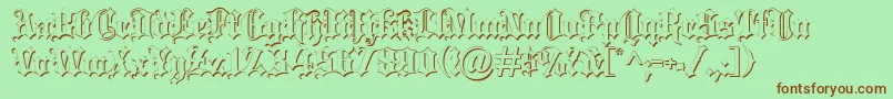 Fonte Blackletter ffy – fontes marrons em um fundo verde