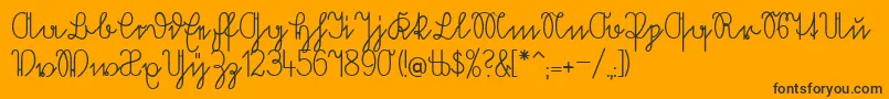 Volkredis Font – Black Fonts on Orange Background