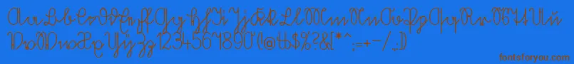 Volkredis Font – Brown Fonts on Blue Background