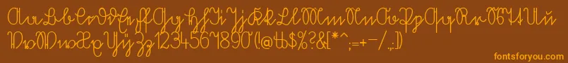 Volkredis Font – Orange Fonts on Brown Background
