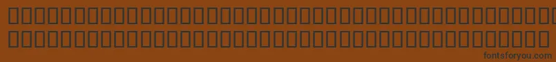 Шрифт EversonMonoLatin6 – чёрные шрифты на коричневом фоне