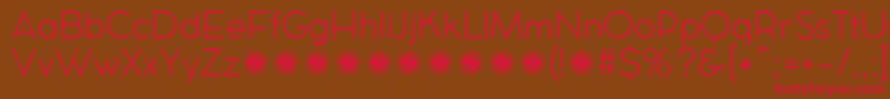 CocomatLightTrial Font – Red Fonts on Brown Background