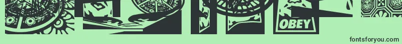 Czcionka Obey3DaltCaps – czarne czcionki na zielonym tle