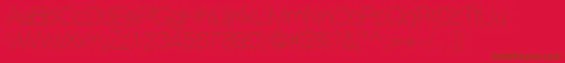HelveticaLt25UltraLight Font – Brown Fonts on Red Background