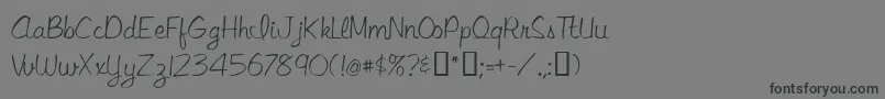 フォントLibbyscript – 黒い文字の灰色の背景