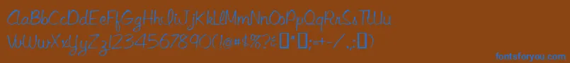 フォントLibbyscript – 茶色の背景に青い文字