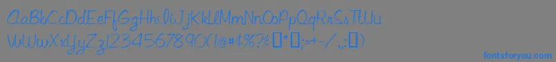 フォントLibbyscript – 灰色の背景に青い文字