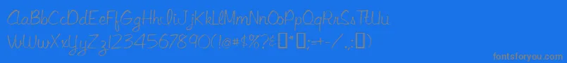 フォントLibbyscript – 青い背景に灰色の文字