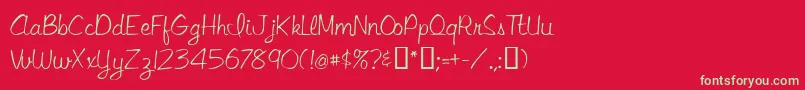 フォントLibbyscript – 赤い背景に緑の文字