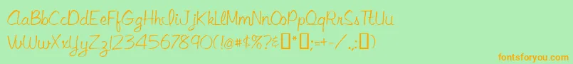 フォントLibbyscript – オレンジの文字が緑の背景にあります。