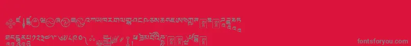 Tibetanmachineweb9-Schriftart – Graue Schriften auf rotem Hintergrund
