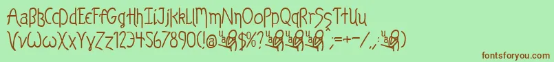 KelpBan Font – Brown Fonts on Green Background