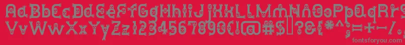 DusthomemanMedium-fontti – harmaat kirjasimet punaisella taustalla
