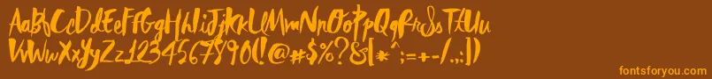 RebelHeartMadonna Font – Orange Fonts on Brown Background