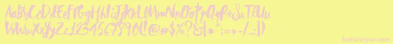 RebelHeartMadonna-Schriftart – Rosa Schriften auf gelbem Hintergrund