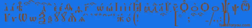 フォントIrmologionKucsSpacedout – 茶色の文字が青い背景にあります。