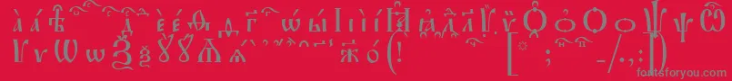 フォントIrmologionKucsSpacedout – 赤い背景に灰色の文字