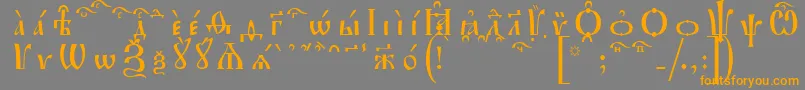 フォントIrmologionKucsSpacedout – オレンジの文字は灰色の背景にあります。