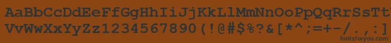 Czcionka Courbd0 – czarne czcionki na brązowym tle