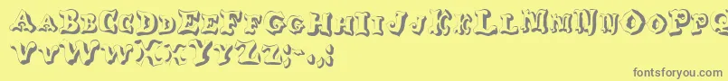 フォントGeGlob – 黄色の背景に灰色の文字