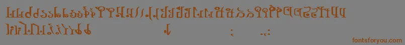 フォントTphylianWiibold – 茶色の文字が灰色の背景にあります。