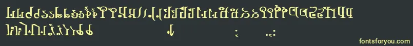 フォントTphylianWiibold – 黒い背景に黄色の文字